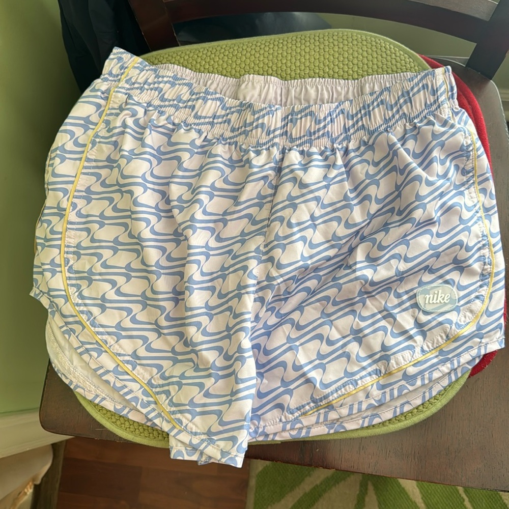 Purple Nike running shorts
